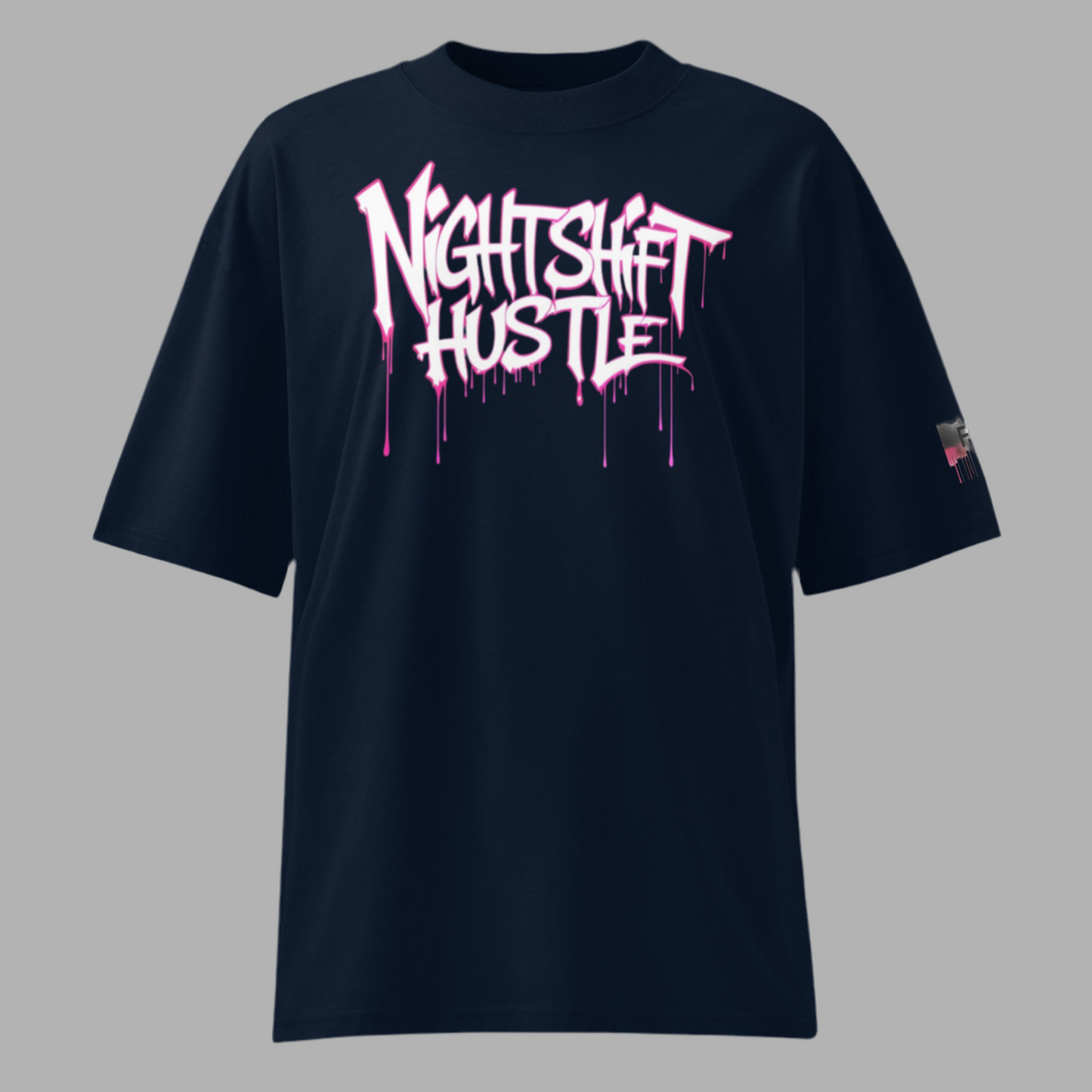 Nightshift Hustle oversized statement shirt made from organic cotton, featuring bold graffiti-style text design.