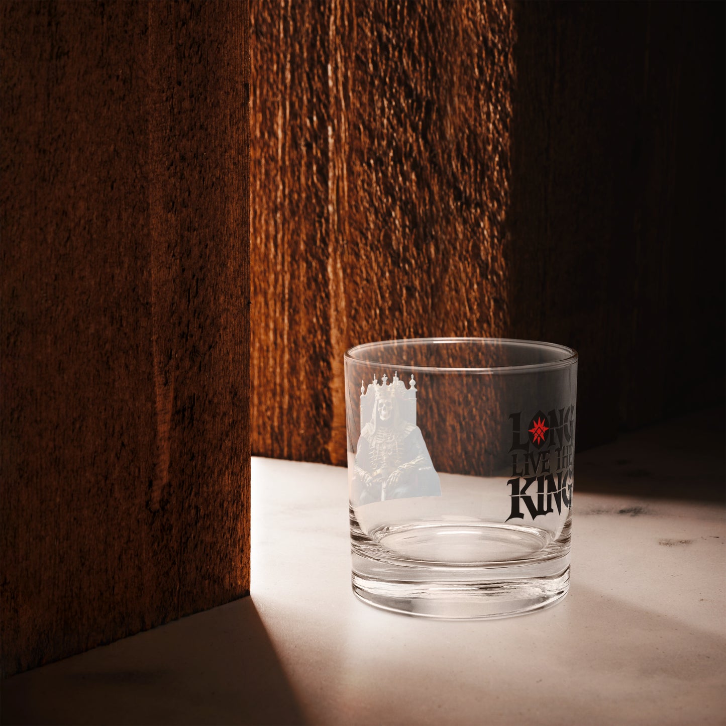 Premium rocks glass with Long Live The King gothic print on wooden surface, ideal for whiskey or cocktails, part of FGH Hustler Collection