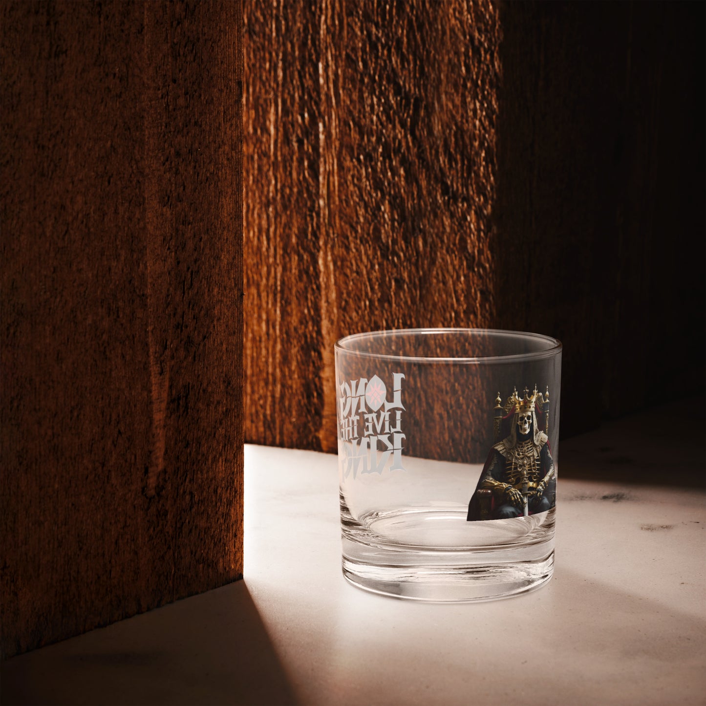 Premium rocks glass with Long Live The King gothic print on wooden surface, ideal for whiskey or cocktails, part of FGH Hustler Collection