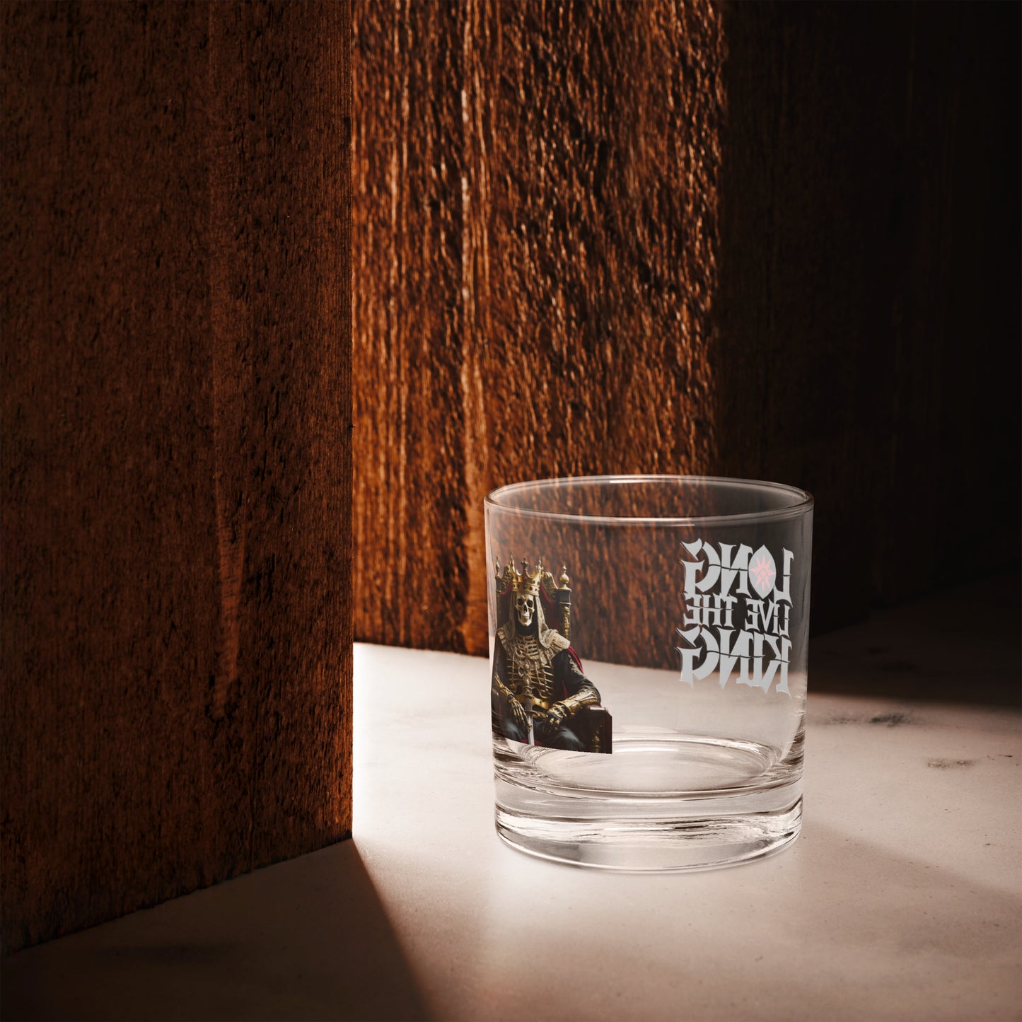 Premium rocks glass with Long Live The King gothic print on wooden surface, ideal for whiskey or cocktails, part of FGH Hustler Collection