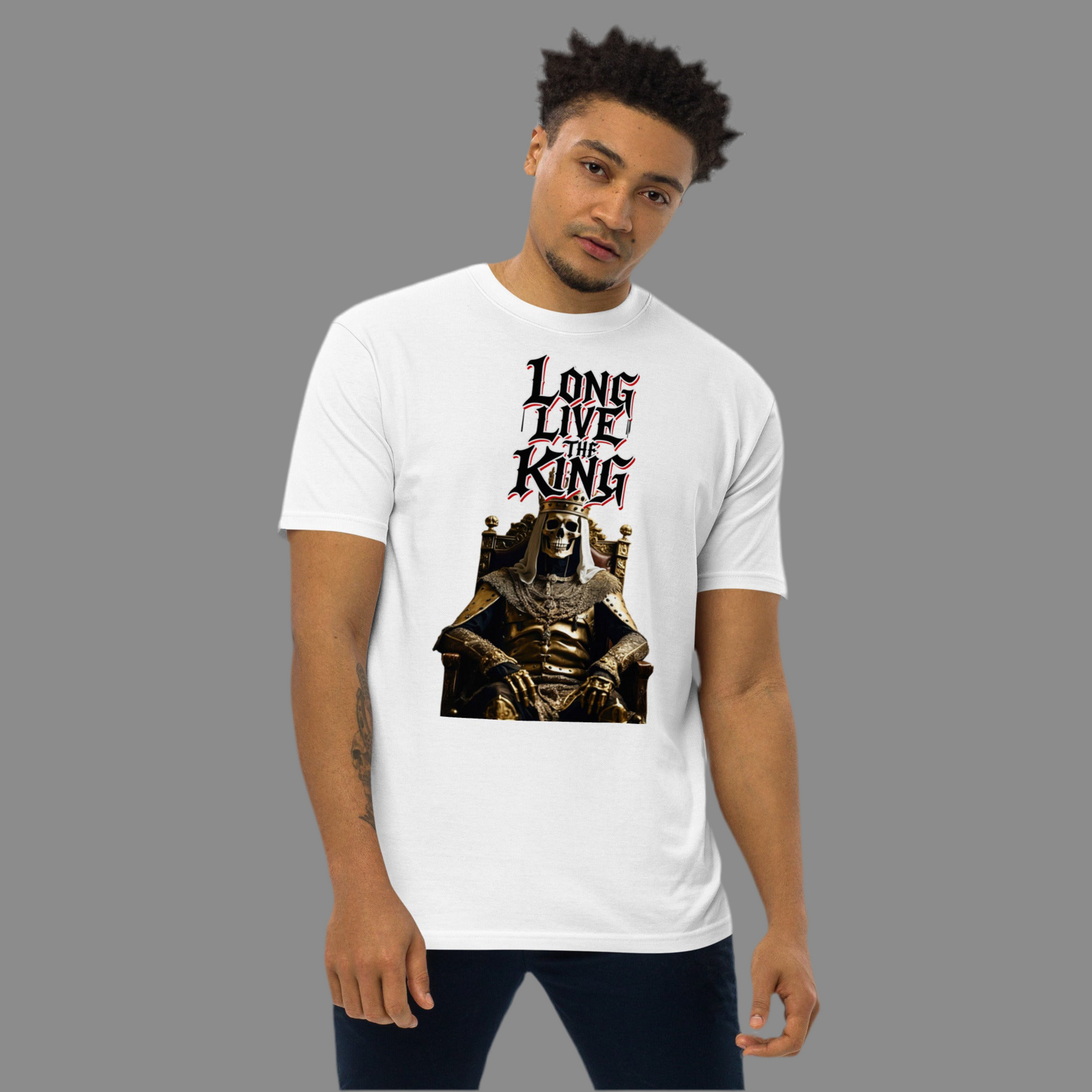 White premium t-shirt featuring gothic-style artwork of a golden skeleton king sitting on a throne with the graffiti slogan “Long Live The King” in bold red, white and black lettering