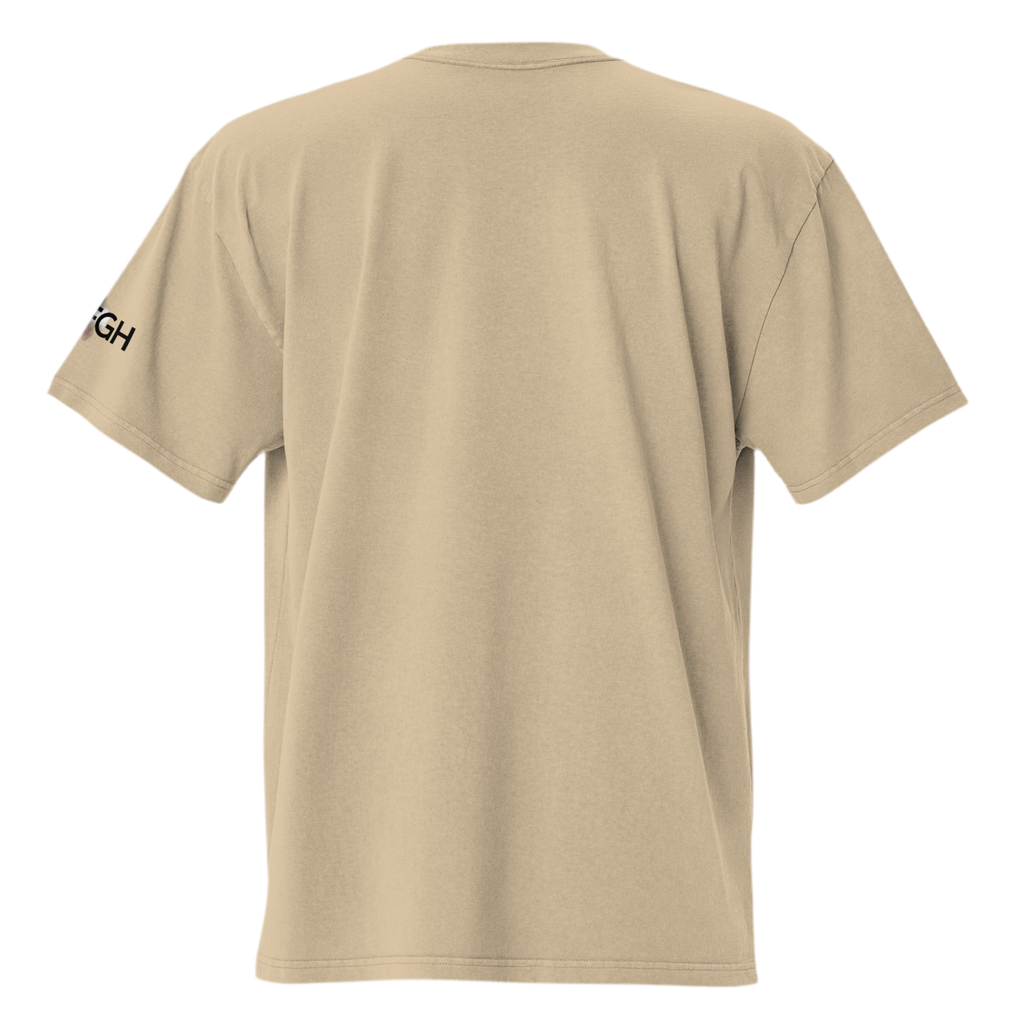 Oversized unisex T-shirt in faded bone color, featuring “Hustle to the Grind” streetwear graphic.