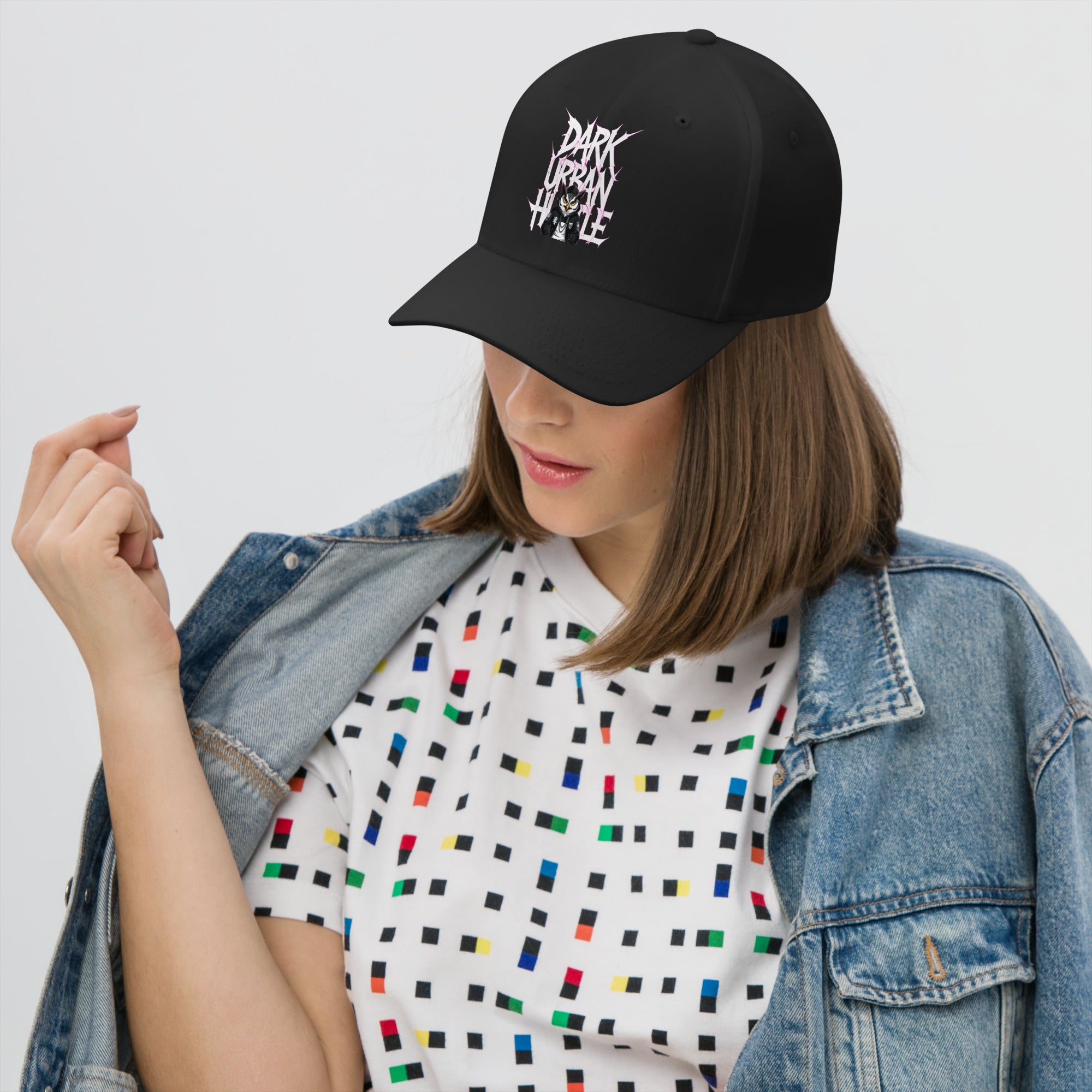 Dark Urban Hustle Flexfit cap featuring bold gothic print, premium streetwear accessory.