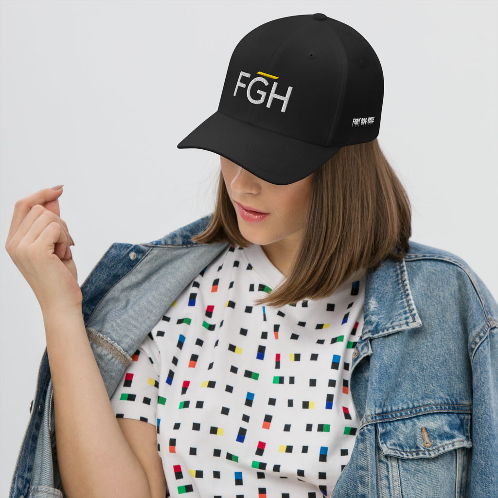 Black streetwear cap with embroidered “FGH” front logo and stitched “Fight Grind Hustle” side detail – premium Swiss urban headwear