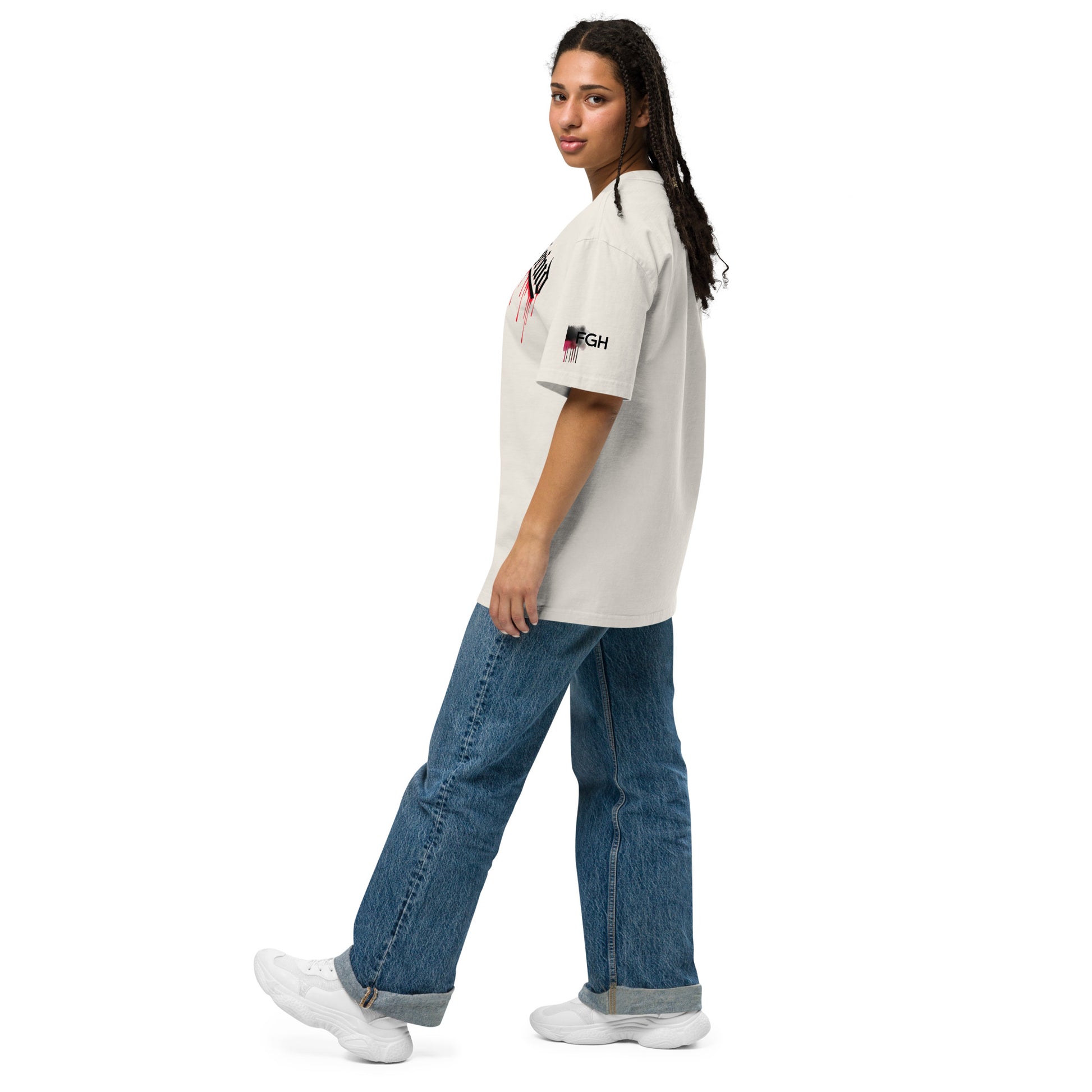 Oversized unisex “Hustle To the Grind” T-shirt in faded white, showcasing urban graffiti streetwear design.
