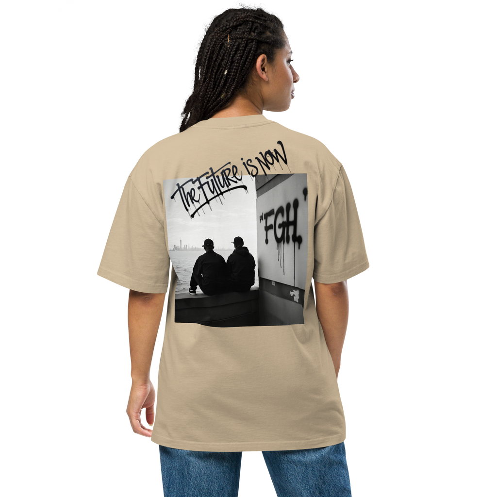 Two men in oversized faded t-shirts sitting by the waterfront, with bold FGH graffiti and a city skyline in the background – urban streetwear aesthetic.
