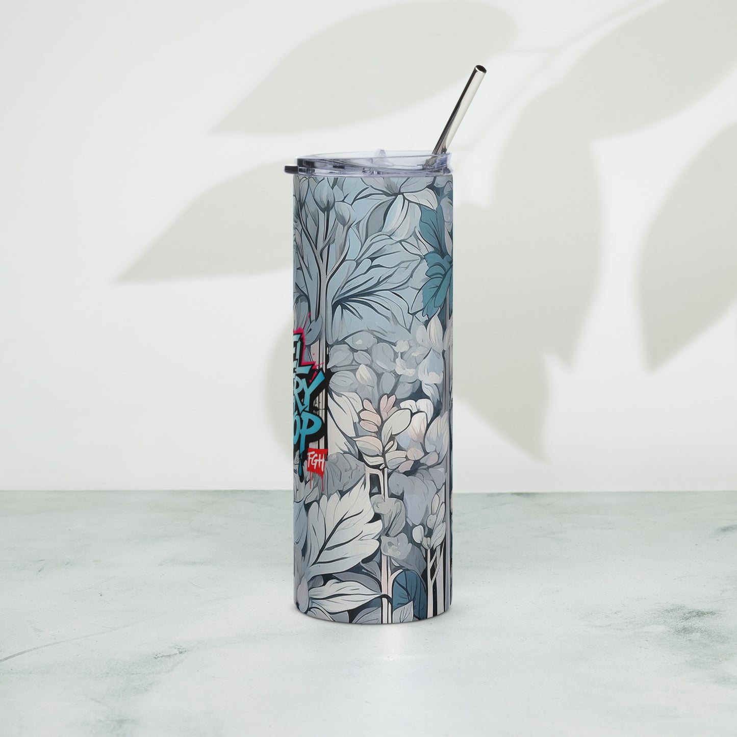 “FGH stainless steel tumbler with graffiti design ‘Feel Every Drop’, premium drinkware for hot and cold drinks”
