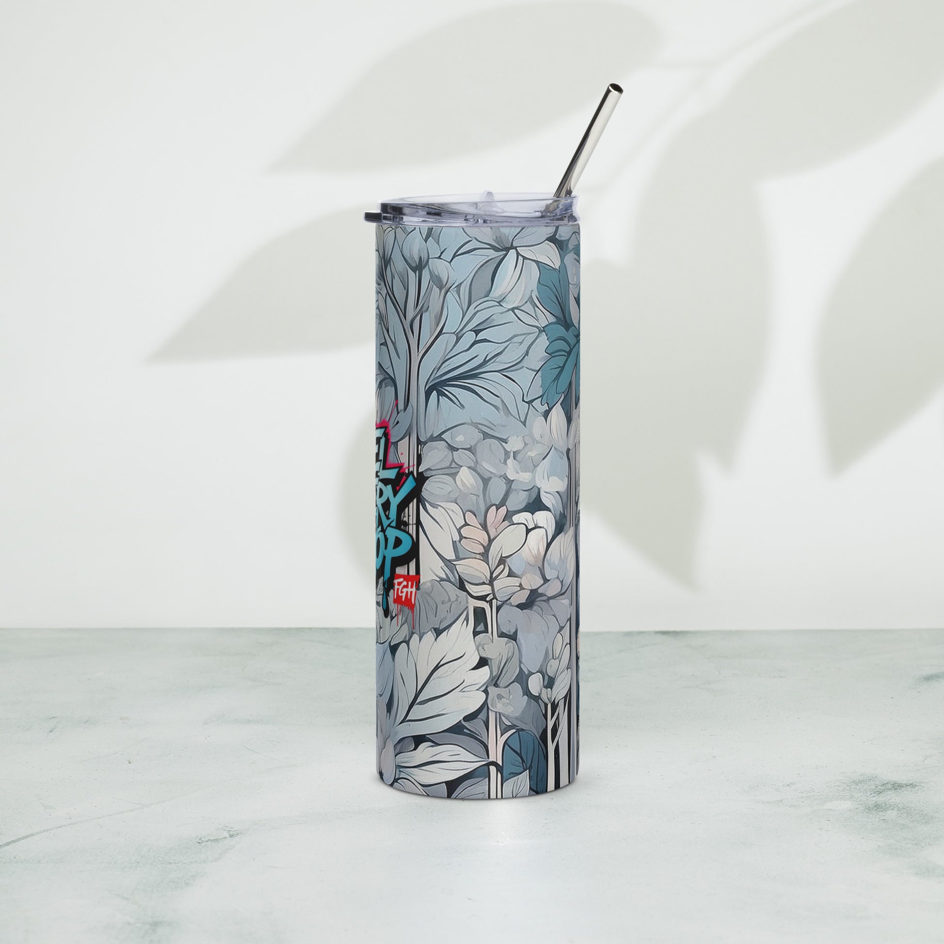 “FGH stainless steel tumbler with graffiti design ‘Feel Every Drop’, premium drinkware for hot and cold drinks”